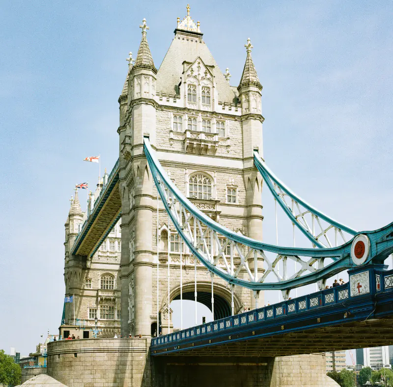 A large bridge with a castle-like structure on top.