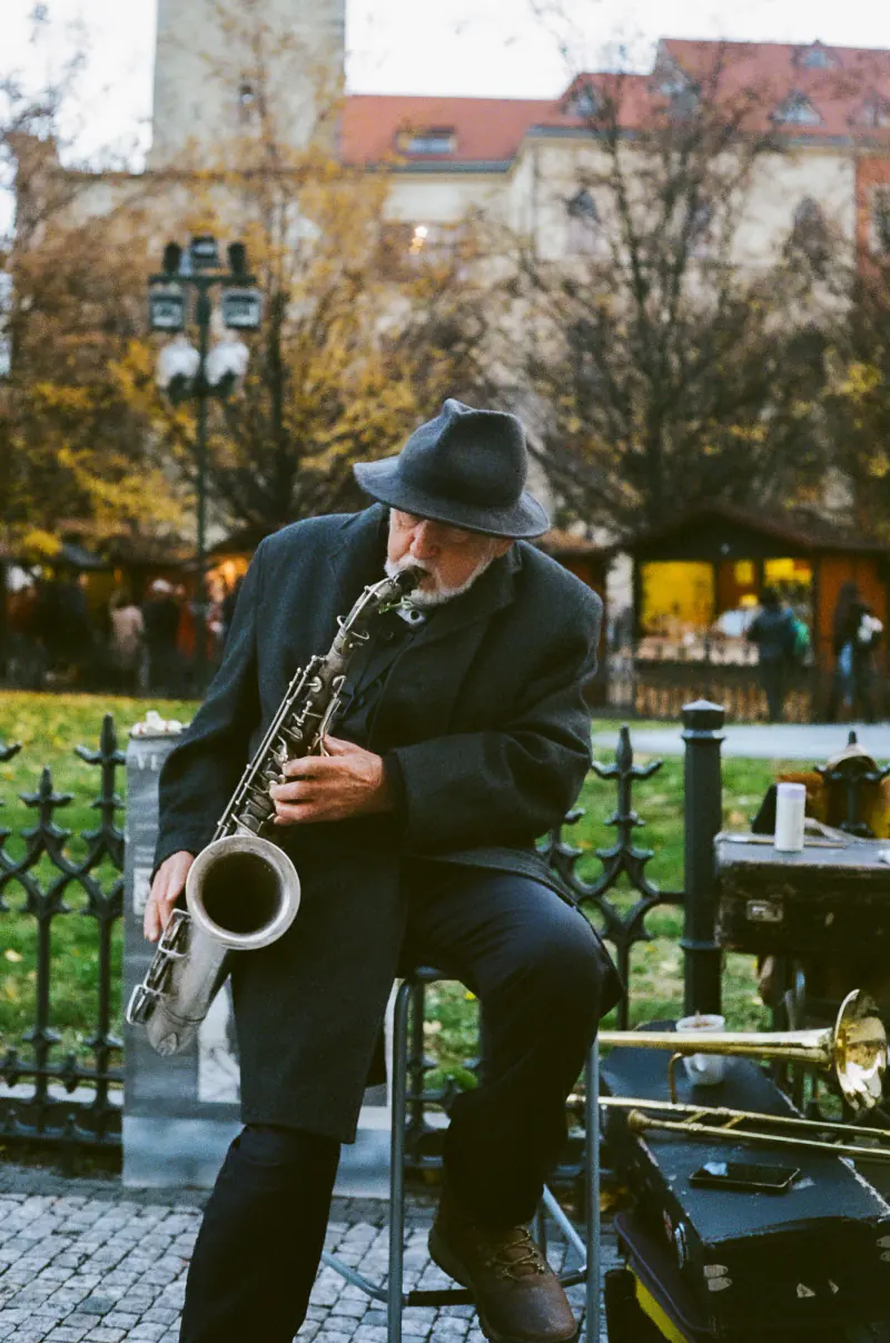 Street busker playing saxophone
