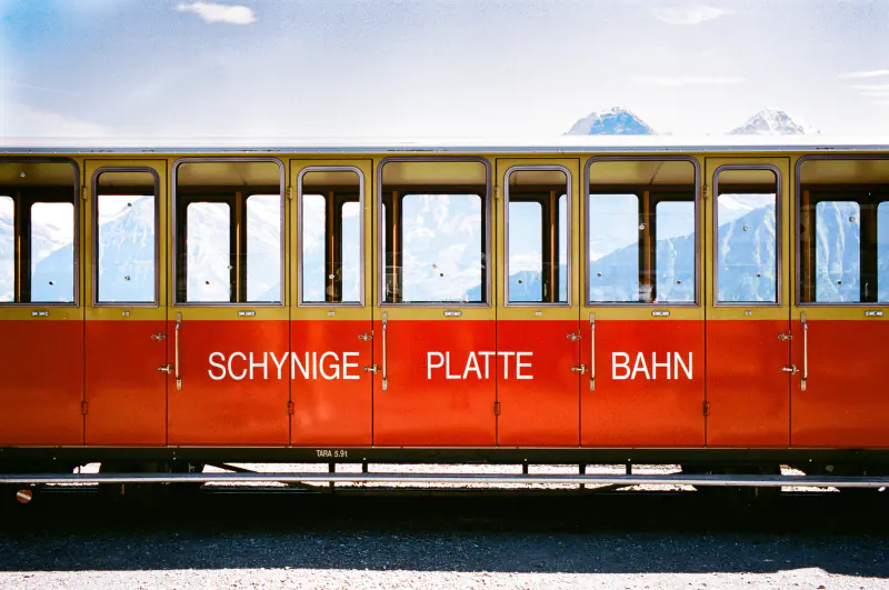 A train with the words "Schynige Platte" on the side.